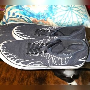 Acid Brand low cut sneaks.